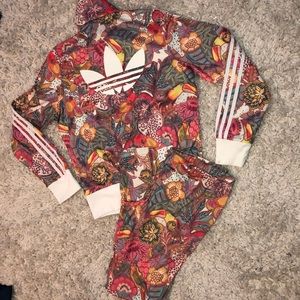 Adidas multi color track suit